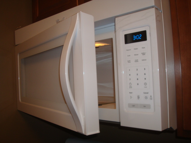 Kitchen Cabinets And Microwave Oven